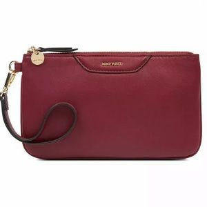 NINE WEST: Ringing Bells East West Wristlet-Claret